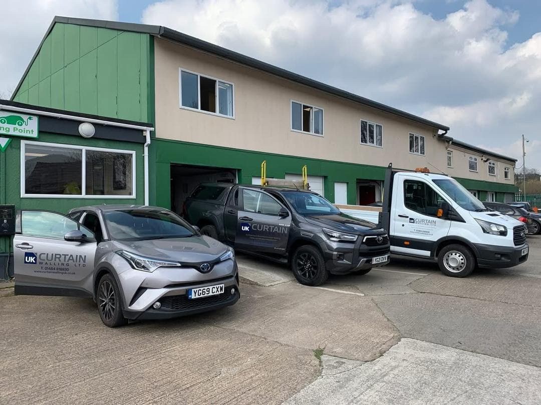 UK Curtain Walling Ltd head office and yard with the company vehicle fleet